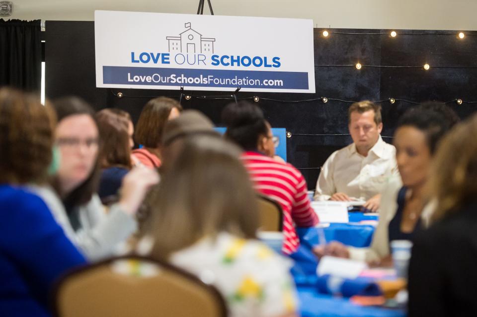 Love Our Schools holds meeting at Rock N Bowl to engage with community businesses, individuals, churches, and nonprofit organizations to build villages around schools in the Lafayette Parish School System. Tuesday, July 27, 2021.