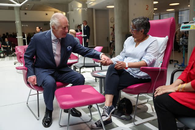 <p>SUZANNE PLUNKETT/POOL/AFP via Getty Images</p> King Charles at the University College Hospital Macmillan Cancer Centre in London on April 30, 2024.