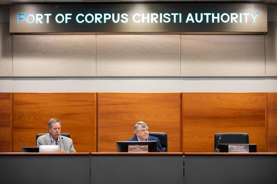 Port Chairman Charles W. Zahn, Jr., center, and Commissioner Bryan Gulley listen to public comment during a meeting on Wednesday, July 26, 2023, in Corpus Christi, Texas.
