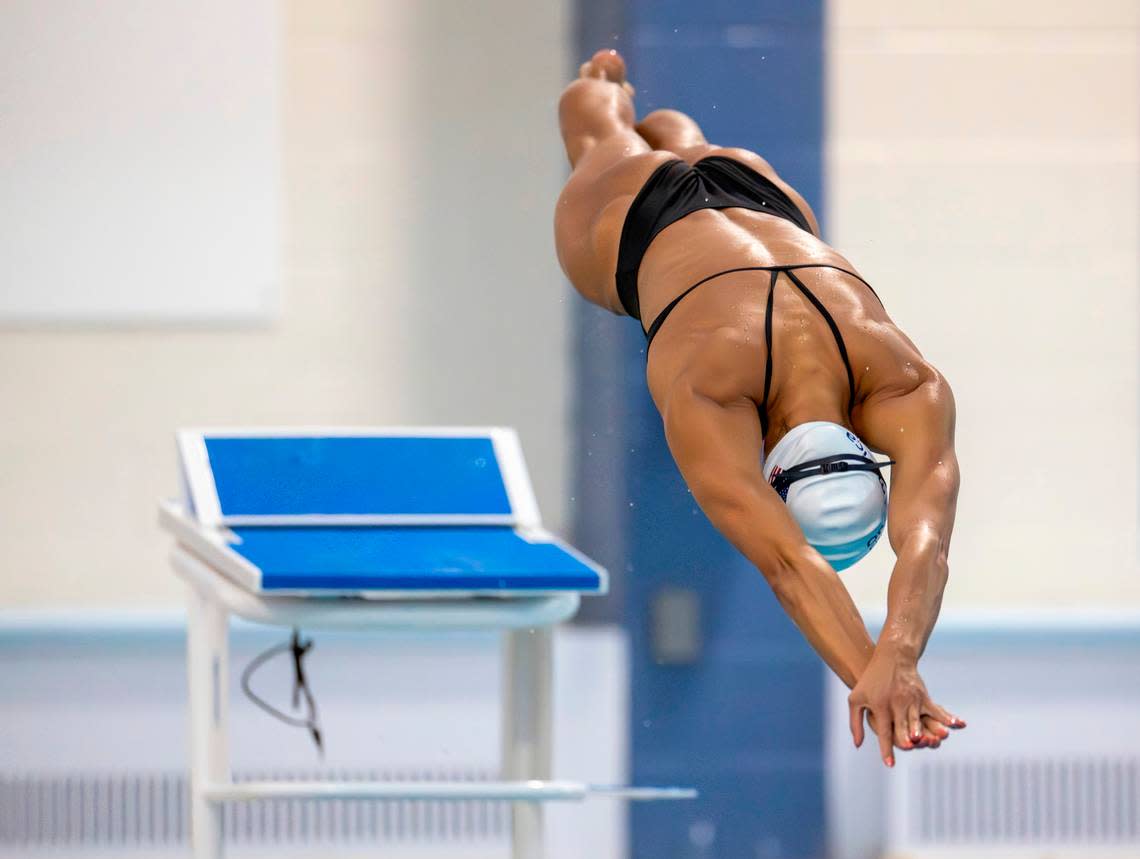 Torri Huske of Arlington, Virginia, an Olympic silver medalist, dives into the pool during the 2024 United States Olympic Swim Team practice on Saturday, July 6, 2024 at the Triangle Aquatic Center in Cary, N.C.