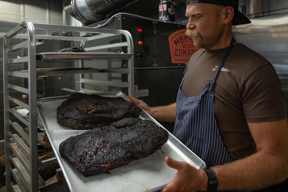 Pitmaster and co-owner Rick Mace features brisket with a smoky bark at his new Tropical BBQ Market in downtown West Palm Beach.