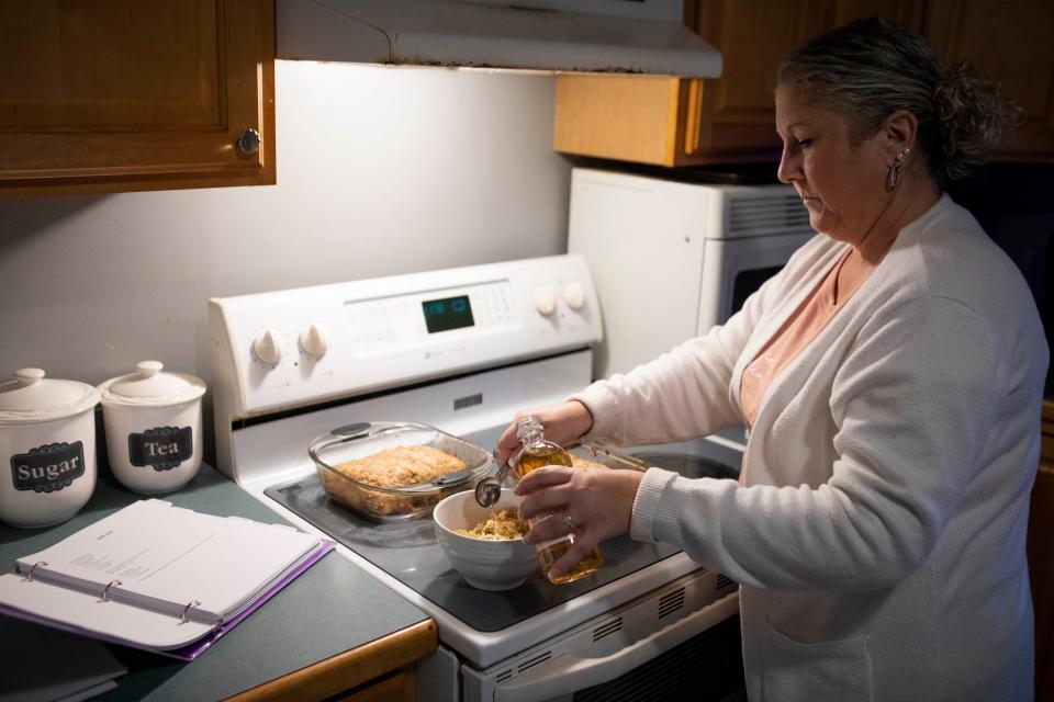 Stacey Rauch prepares her "Ham Loaf" in her kitchen at her home on December 7, 2022 in Lancaster, Ohio.
(Photo: Ty Wright/Eagle Gazette)