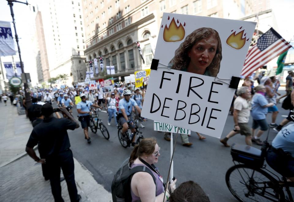 A Sanders supporter in Philadelphia holds up a sign calling for firing of Debbie Wasserman Schultz, then chairwoman of the Democratic National Committe. (Photo: Alex Brandon/AP)