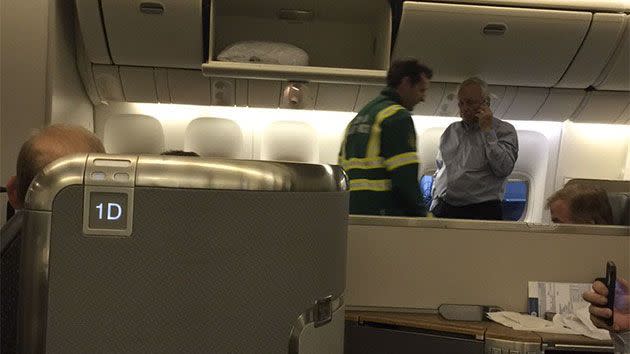 Eric Winter captured this image of an official at Heathrow testing the air inside the cabin. Photo: Twitter/ Eric Winter