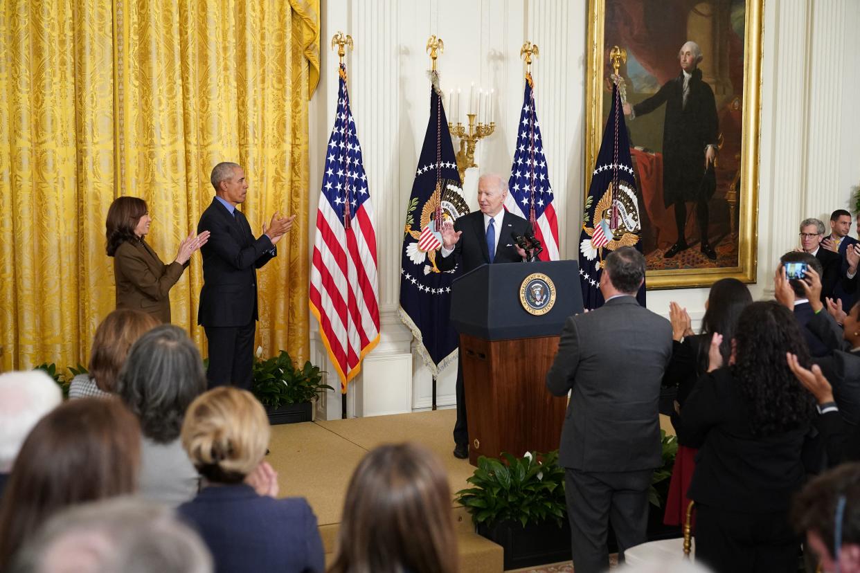 Harris and Obama applaud as President Biden delivers remarks on the Affordable Care Act and Medicaid at the White House on Tuesday. 
