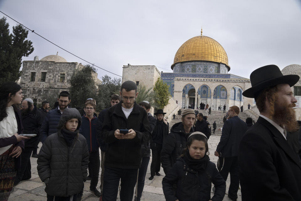 Jewish worshippers visit the Temple Mount at Al-Aqsa Mosque compound, known to Muslims as the Noble Sanctuary, in the Old City of Jerusalem, Tuesday, Jan. 3, 2023. Itamar Ben-Gvir, an ultranationalist Israeli Cabinet minister, visited the flashpoint Jerusalem holy site Tuesday for the first time since taking office in Prime Minister Benjamin Netanyahu's new far-right government last week. The visit is seen by Palestinians as a provocation. (AP Photo/Maya Alleruzzo)