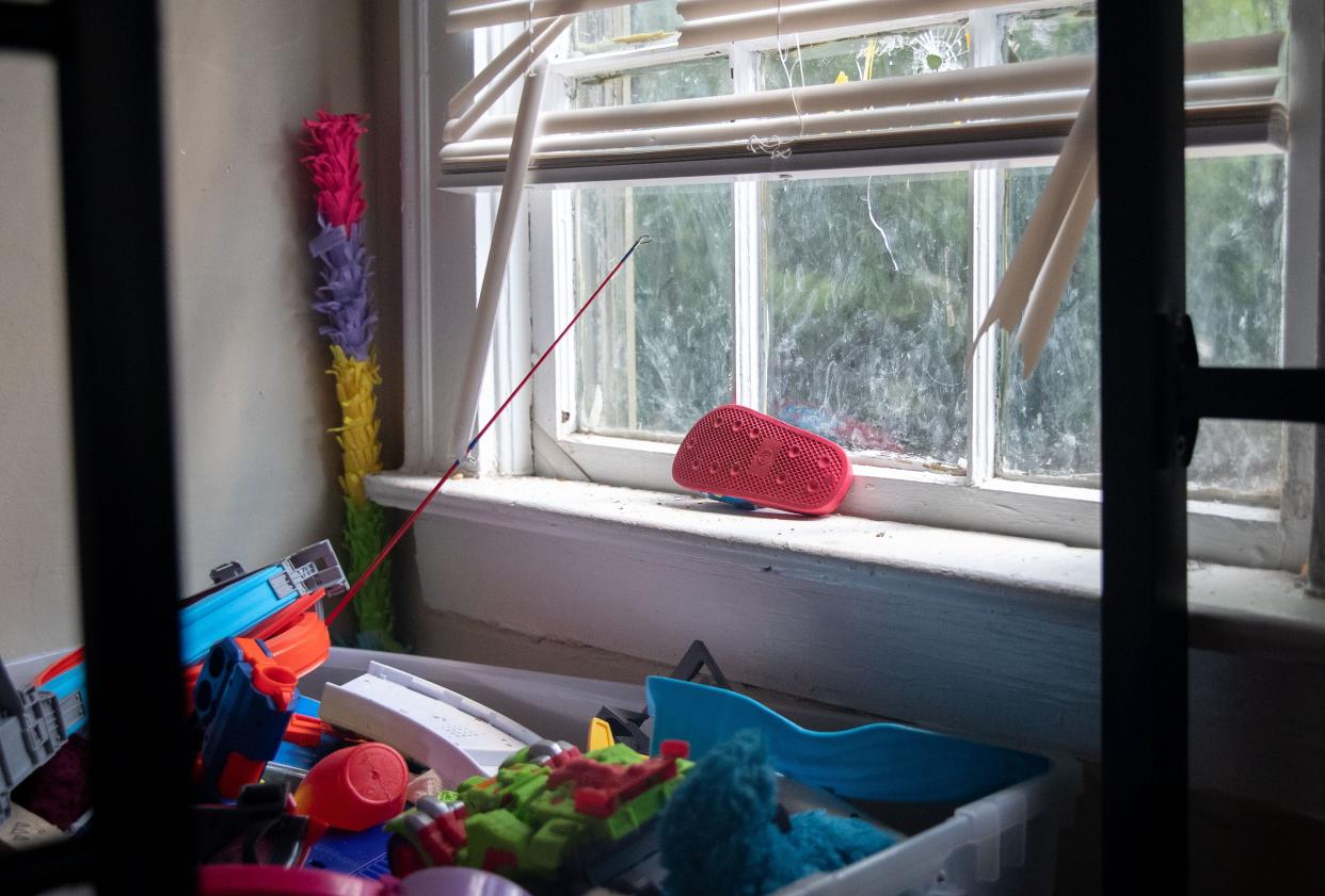 A bullet hole is in the window of a bedroom in Marcus Cash’s home Thursday, Sept. 8, 2022, in Memphis. Cash’s children, ages 8 months and 5 years, were falling asleep in the bedroom where the shots entered around midnight. Cash’s friend and business partner, Dewayne Tunstall, was killed in the shooting.