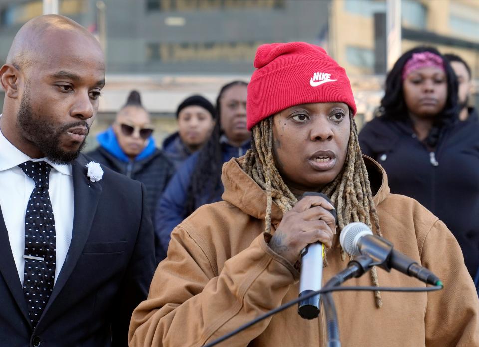 Lakeya Cleveland, daughter of Michael Cleveland, 66, who was shot by Columbus police on Feb. 5, 2023, stands with attorney Sean Walton during a press conference Feb. 13, 2023, outside Columbus police headquarters, Downtown.