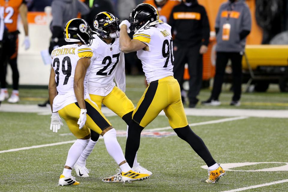 Pittsburgh Steelers outside linebacker T.J. Watt (90) celebrates a tackle for loss in the first quarter during an NFL Week 15 football game against the Cincinnati Bengals, Monday, Dec. 21, 2020, at Paul Brown Stadium in Cincinnati. 