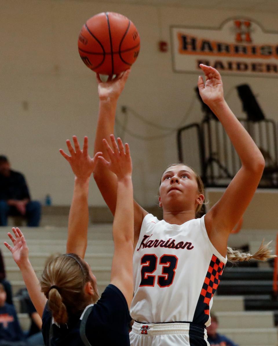 Harrison Raiders forward Riley Whitlock (23) shoots the ball during the IHSAA girl’s basketball game against the Central Catholic Knights, Wednesday, Nov. 29, 2023, at Harrison High School in West Lafayette, Ind. Harrison won 47-43.