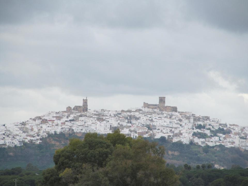 This Jan. 17, 2013 photo shows a panorama of Arcos de la Frontera, one of the most easily reachable of Spain’s “pueblos blancos,” or white villages. The town, with monuments dating back from the 15th century, looms over Andalucia's farmland. (AP Photo/Giovanna Dell’Orto)