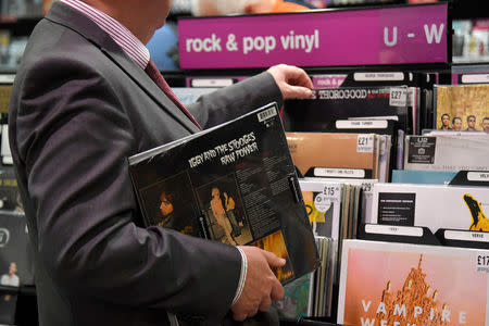 Shoppers browse record albums at an HMV music store in London, Britain, July 20, 2018. REUTERS/Toby Melville