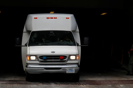 A vehicle, carrying asylum seekers brought from Tijuana, Mexico to the United States for their immigration hearing, arrives at a court in San Diego, California, U.S., March 19, 2019. REUTERS/ Mike Blake