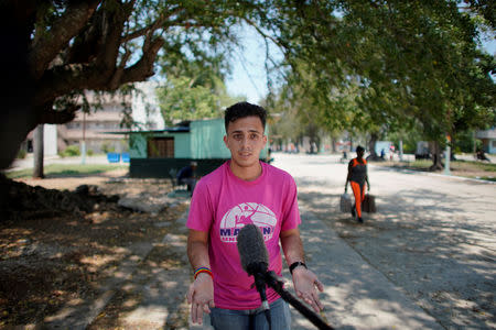 Gay rights activist Jancel Moreno gestures during an interview in Havana, Cuba, May 7, 2019. REUTERS/Alexandre Meneghini