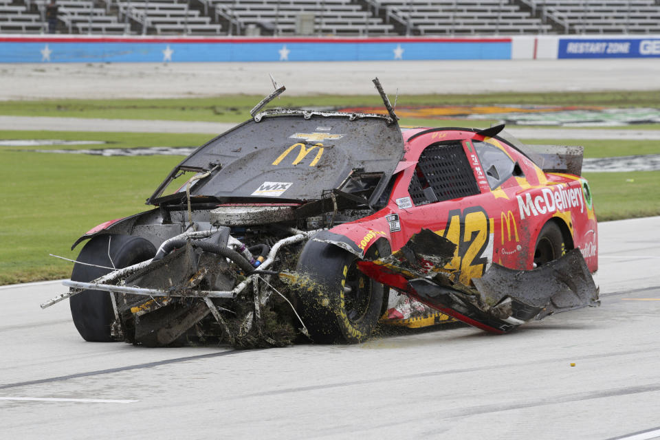 Matt Kenseth drives his damaged car during the NASCAR Cup Series auto race at Texas Motor Speedway in Fort Worth, Texas, Wednesday, Oct. 28, 2020. (AP Photo/Richard W. Rodriguez)