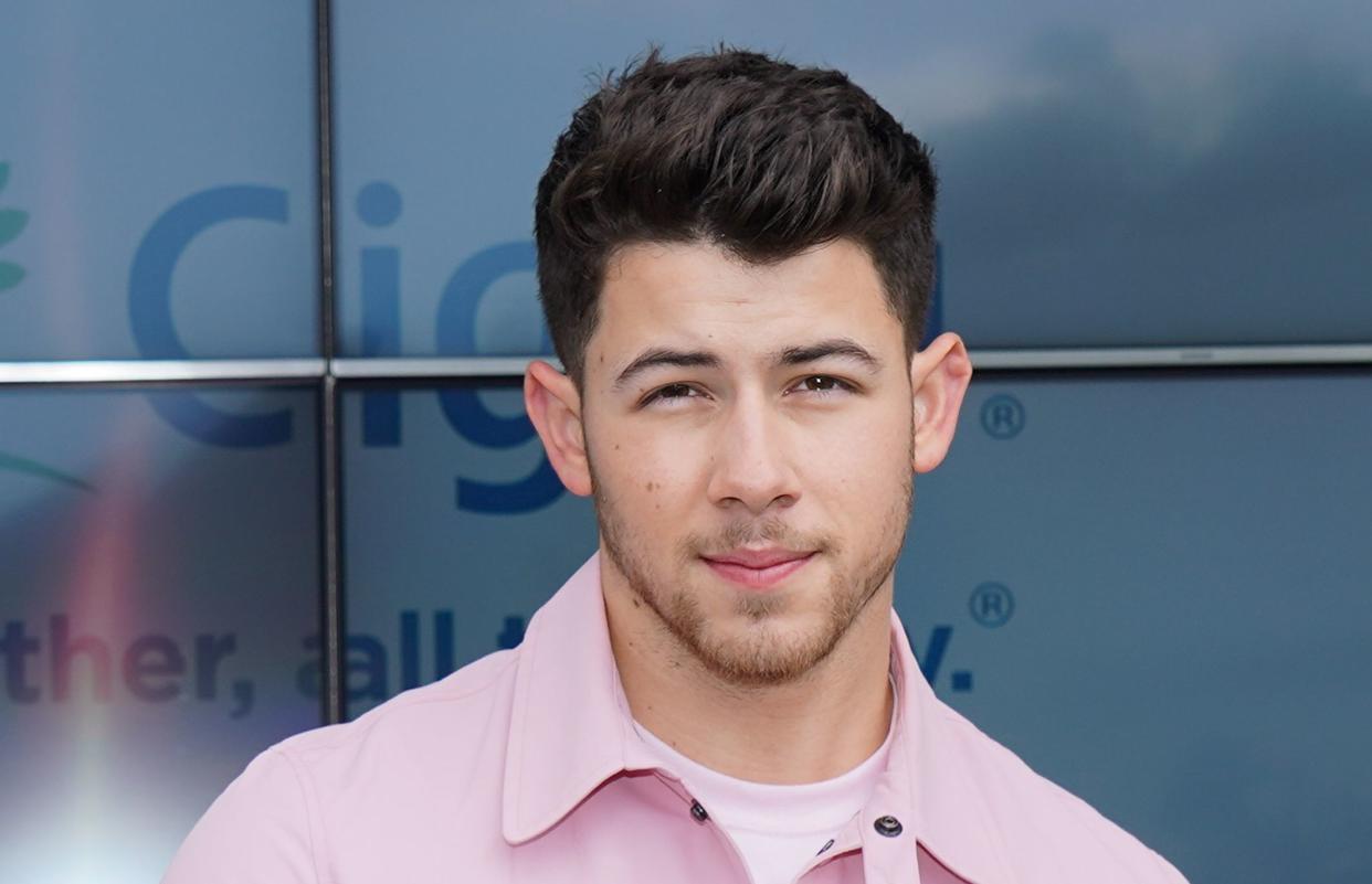 Nick Jonas recently revealed that he and his brothers went to therapy prior to reuniting as a band. (Photo: Rachel Luna via Getty Images)
