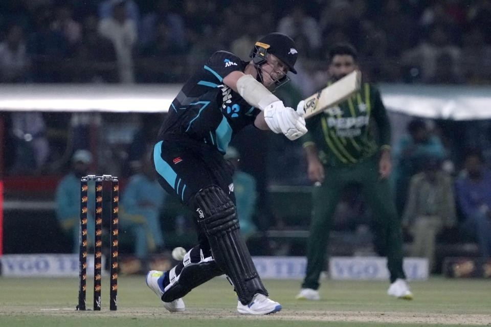 New Zealand's Michael Bracewell plays a shot during the fourth T20 international cricket match between Pakistan and New Zealand, in Lahore, Pakistan, Thursday, April 25, 2024. (AP Photo/K.M. Chaudary)