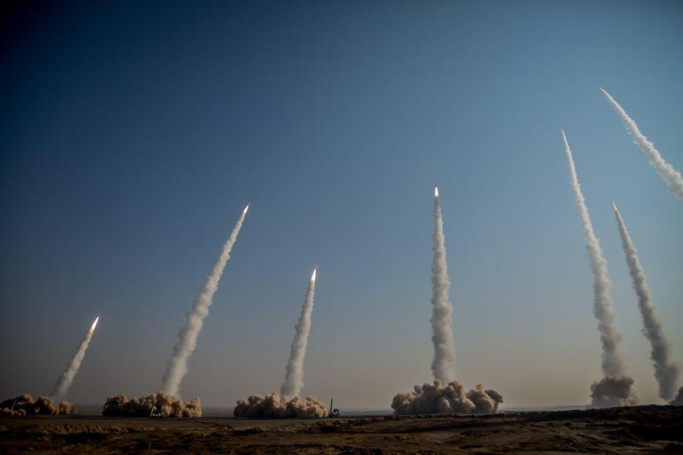 In this photo released on Friday, Jan. 15, 2021, by the Iranian Revolutionary Guard, missiles are launched in a drill in Iran. Iran's paramilitary Revolutionary Guard forces on Friday held a military exercise involving ballistic missiles and drones in the country's central desert, state TV reported, amid heightened tensions over Tehran's nuclear program and a U.S. pressure campaign against the Islamic Republic. (Iranian Revolutionary Guard/Sepahnews via AP)