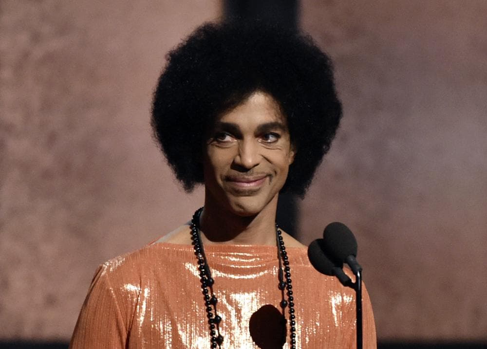 Prince presents the album of the year awards at the 57th annual Grammy Awards in Los Angeles on Feb. 8, 2015. (Photo by John Shearer/Invision/AP, File)
