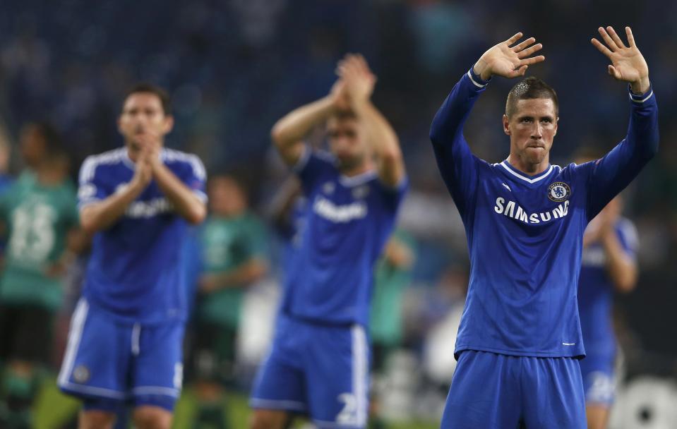 Chelsea's Fernando Torres waves at the end of their Champions League soccer match against Schalke 04 in Gelsenkirchen October 22, 2013. REUTERS/Wolfgang Rattay (GERMANY - Tags: SPORT SOCCER)