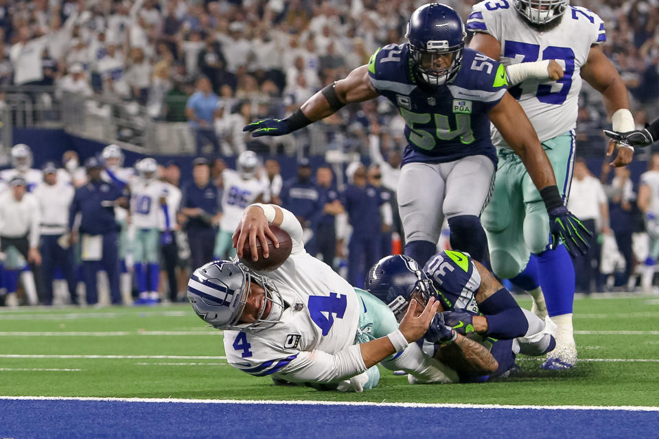 <p>Seattle Seahawks strong safety Bradley McDougald (30) tackles Dallas Cowboys quarterback Dak Prescott (4) just short of the goal line during the NFC wildcard playoff game between the Seattle Seahawks and Dallas Cowboys on January 5, 2019 at AT&T Stadium in Arlington, TX. (Photo by Andrew Dieb/Icon Sportswire) </p>