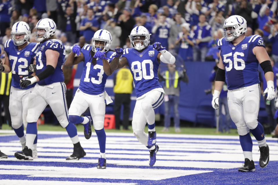 Indianapolis Colts wide receiver Chester Rogers (80) celebrates his game-winning touchdown with wide receiver T.Y. Hilton (13) during the second half of an NFL football game against the New York Giants in Indianapolis, Sunday, Dec. 23, 2018. The Colts defeated the Giants 28-27. (AP Photo/Michael Conroy)