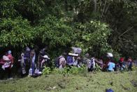 Migrants continue their trek north, near Acandi, Colombia, Wednesday, Sept. 15, 2021. The migrants, mostly Haitians, are on their way to crossing the Darien Gap from Colombia into Panama dreaming of reaching the U.S. (AP Photo/Fernando Vergara)