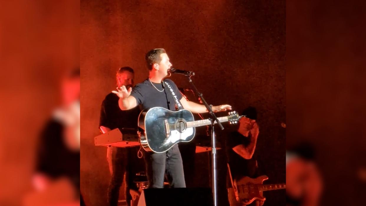 Country singer Scotty McCreery stops show to confront a man who allegedly hit a woman