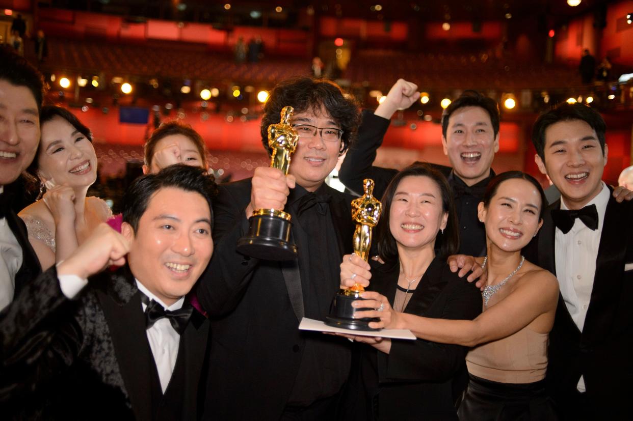 The cast and crew of Parasite at the Oscars last February. (Photo: Eric McCandless via Getty Images)