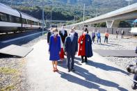 Swiss President Simonetta Sommaruga and Swiss Foreign Minister Cassis arrive before the opening ceremony of the newly built Ceneri Base Tunnel near Camorino