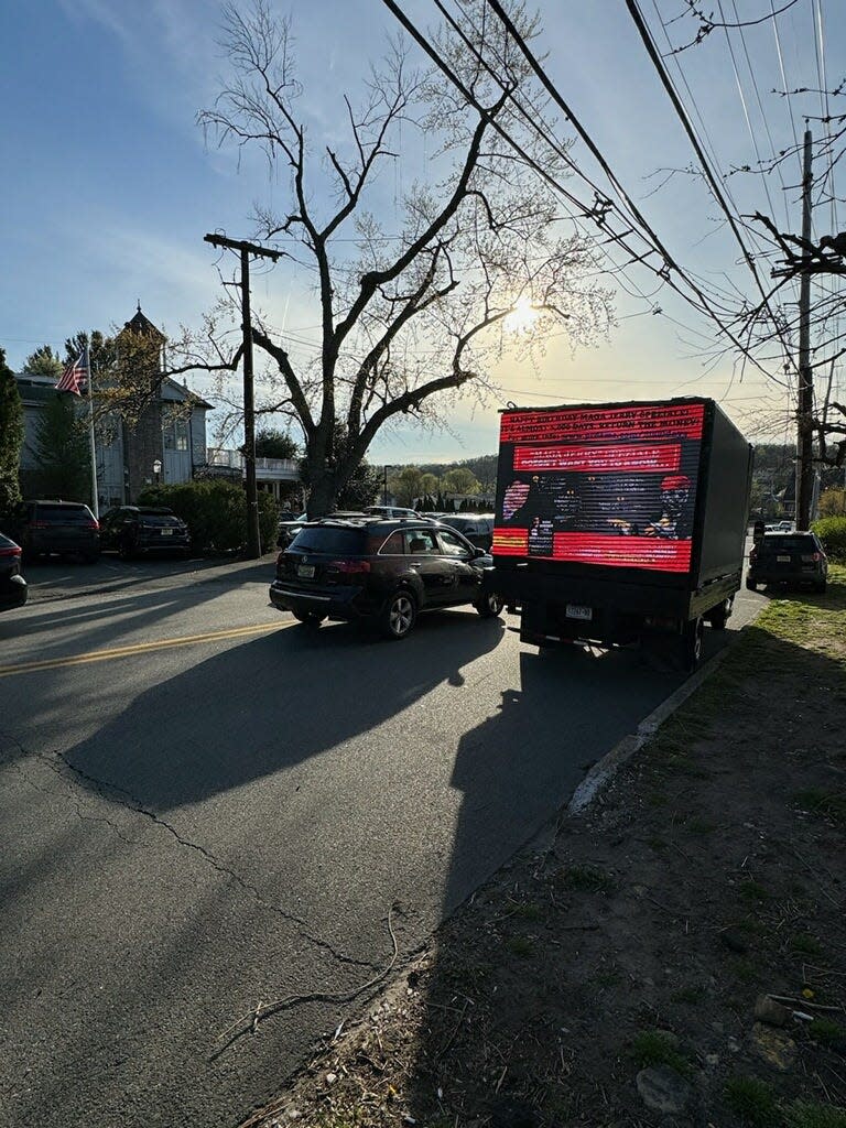 Video advertising truck parked outside the Brownstone banquet hall in Paterson on Tuesday.