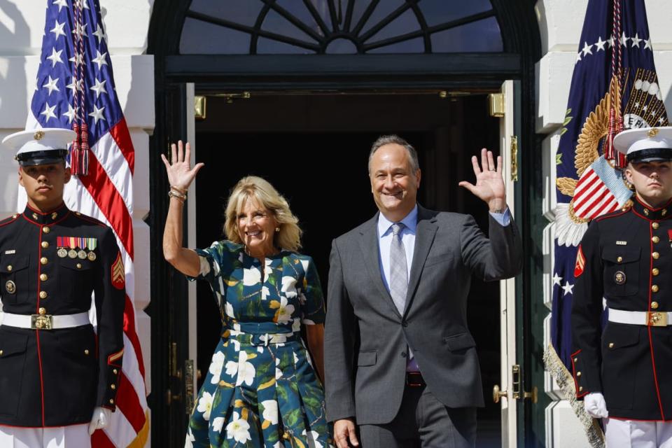 WASHINGTON, DC – SEPTEMBER 13: U.S. First Lady Jill Biden and Second Gentleman Doug Emhoff arrive to an event celebrating the passage of the Inflation Reduction Act on the South Lawn of the White House on September 13, 2022 in Washington, DC. H.R. 5376, the Inflation Reduction Act of 2022 was passed by the House and Senate and later signed by Biden in August. (Photo by Anna Moneymaker/Getty Images)