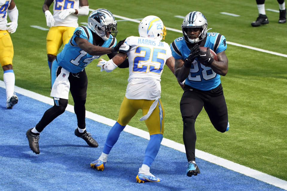 Carolina Panthers running back Mike Davis (28) runs into the end zone with for a touchdown after a reception during the first half of an NFL football game Los Angeles Chargers Sunday, Sept. 27, 2020, in Inglewood, Calif. (AP Photo/Ashley Landis)