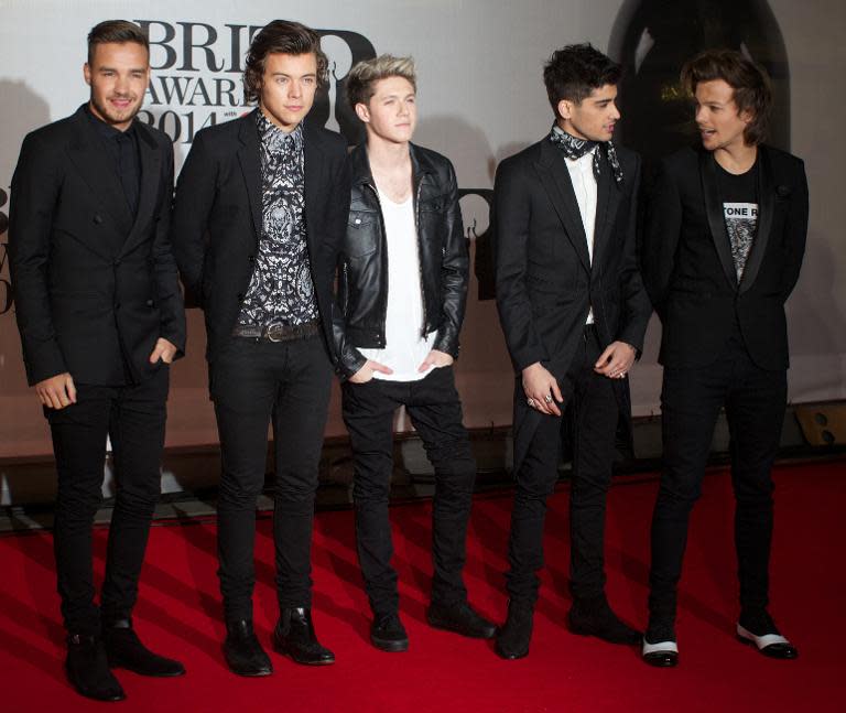 (From L) Liam Payne, Harry Styles, Niall Horan, Zayn Malik and Louis Tomlinson of British-Irish pop band One Direction pose on the red carpet ahead of the BRIT Awards in London, on February 19, 2014