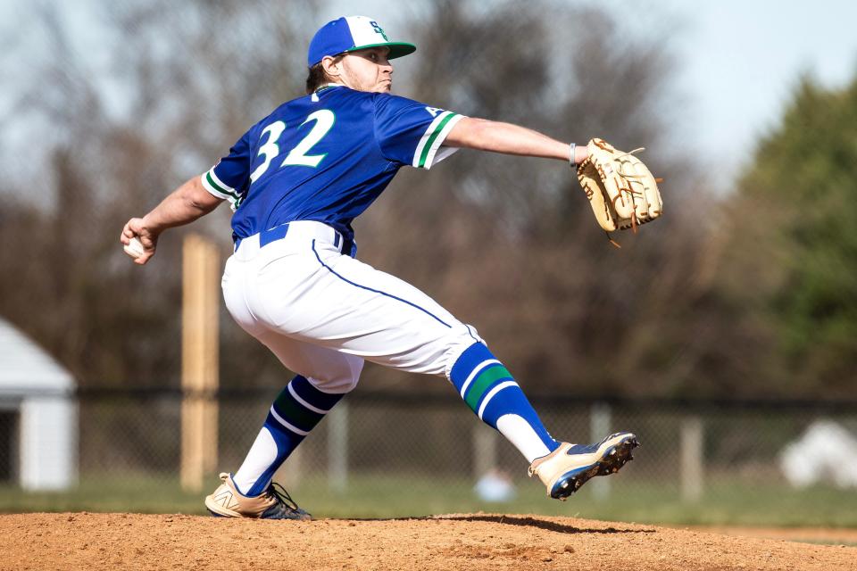 St. Georges Technical High School senior James Breen (32) winds up for a pitch against Polytech High School at the baseball season opener at St. Georges in Middletown, Tuesday, March 21, 2023.  St. Georges won 12-2.