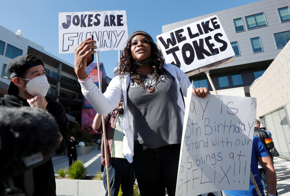Actor Blossom C. Brown speaks in front of counter protesters as she attends a rally in support of the Netflix transgender employee walkout ?Stand Up in Solidarity? to protest the streaming of comedian Dave Chappelle?s new comedy special, in Los Angeles, California, U.S. October 20 2021. REUTERS/Mario Anzuoni