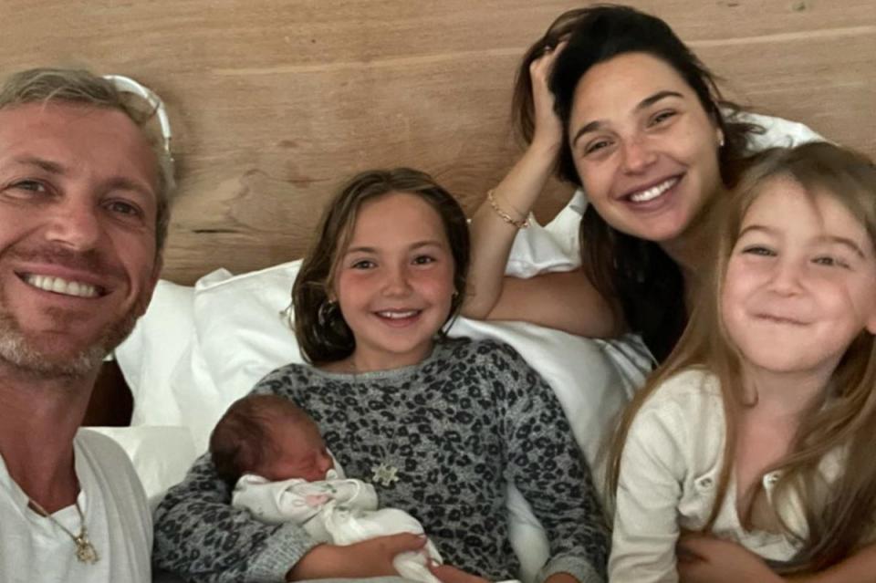 Gadot pictured with her husband Jaron Varsano with their daughters Alma, Maya and Daniella, when she was born in 2021 (Gal Gadot/ Instagram)