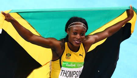 2016 Rio Olympics - Athletics - Final - Women's 200m Final - Olympic Stadium - Rio de Janeiro, Brazil - 17/08/2016. Elaine Thompson (JAM) of Jamaica reacts after winning the race REUTERS/David Gray