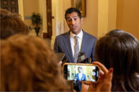 Assembly Speaker Robert Rivas, D-Hollister, talks to reporters after the Assembly approved a measure to reduce the state budget deficit at the Capitol in Sacramento, Calif., Thursday,, April 11, 2024. Both houses approved the bill that takes a number of steps to reduce the state budget deficit by about $17 billion. Gov. Gavin Newsom has said the deficit is about $38 billion. (AP Photo/Rich Pedroncelli)