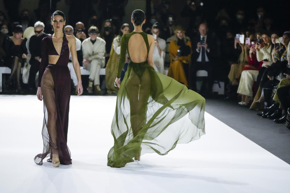 Models wear creations for the Stephane Rolland Spring-Summer 2022 Haute Couture fashion collection collection, in Paris, Tuesday, Jan. 25, 2022. (AP Photo/Francois Mori)