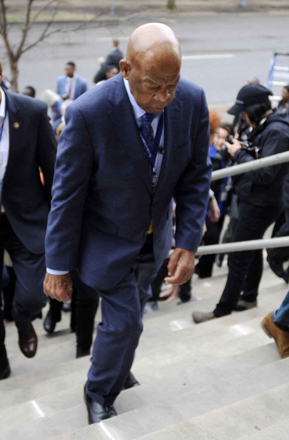 Rep. John Lewis, D-Ga., walks up the steps of 16th Street Baptist Church in Birmingham, Ala., on Friday, March 1, 2019. Lewis is among the members of Congress participating in a civil rights pilgrimage through Alabama. Four black girls died in a Ku Klux Klan bombing at the church in 1963. (AP Photo/Jay Reeves)