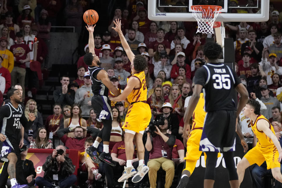 Kansas State guard Markquis Nowell shoots over Iowa State guard Gabe Kalscheur (22) during the first half of an NCAA college basketball game, Tuesday, Jan. 24, 2023, in Ames, Iowa. (AP Photo/Charlie Neibergall)