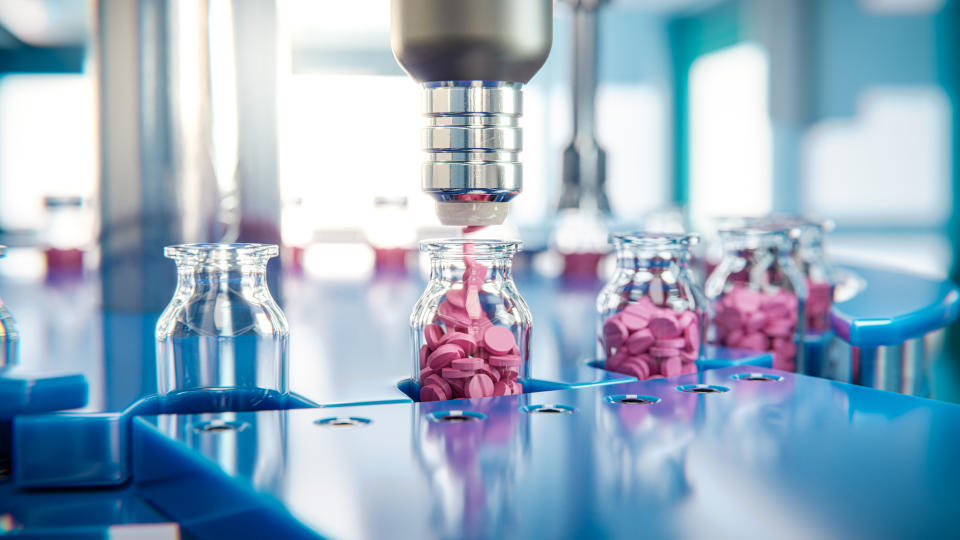 Pills being dispensed in a laboratory