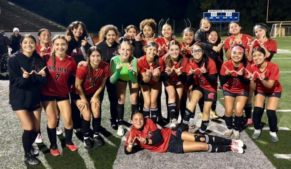 The Rio Mesa High girls soccer team poses for a photo after beating Ventura 3-1 in a Channel League play-in game at San Marcos High on Thursday night. The Spartans clinched the league's final automatic playoff berth.
