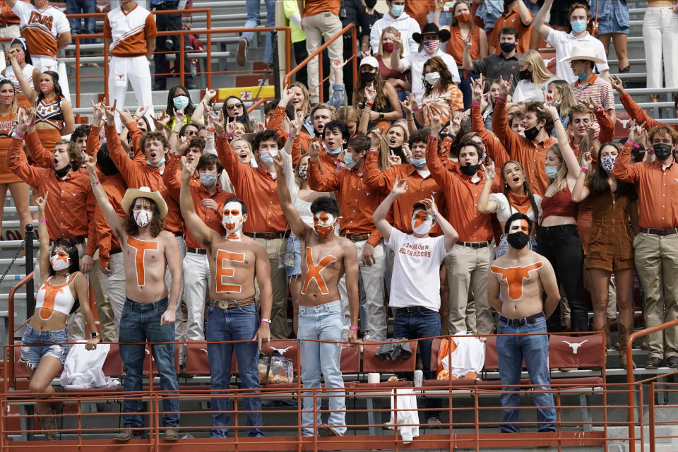 FILE - Texas students cheers during the first half of the team's NCAA college football game against Baylor in Austin, Texas, Oct. 24, 2020. Texas had the largest enrollment among Big 12 schools before UCF joined the conference in 2023. (AP Photo/Chuck Burton, File)