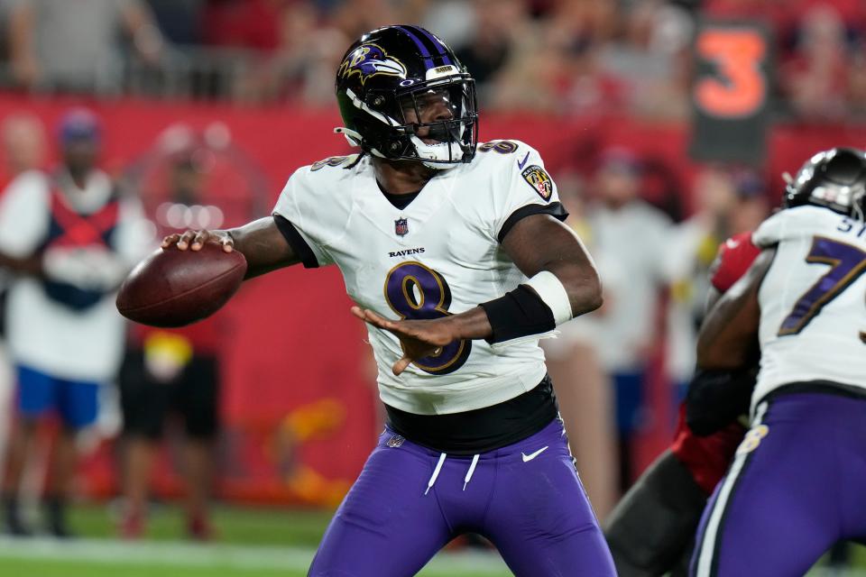 Baltimore Ravens quarterback Lamar Jackson throws during the first half of an NFL football game against the Tampa Bay Buccaneers Thursday, Oct. 27, 2022, in Tampa, Fla. (AP Photo/Chris O'Meara)