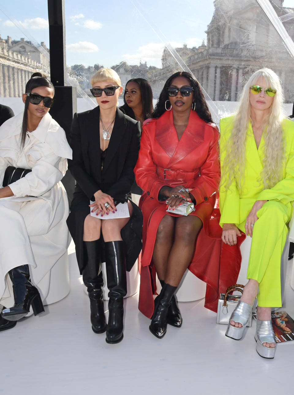 LONDON, ENGLAND - OCTOBER 10: (L to R) Ramla Ali, Pom Klementieff, Tiwa Savage and Kristen McMenamy attend the Alexander McQueen SS23 Womenswear show at the Old Royal Naval College on October 11, 2022 in Greenwich, England. (Photo by David M. Benett/Dave Benett/Getty Images for Alexander McQueen)