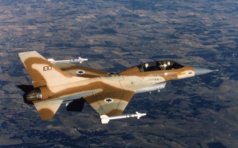 AP I ISR ISRAEL AIR FORCE F-16 JET FIGHTER...An Israeli Air Force F-16 jet fighter in flight over Israel 1980. (AP Photo/Str/HO) - STR/AP