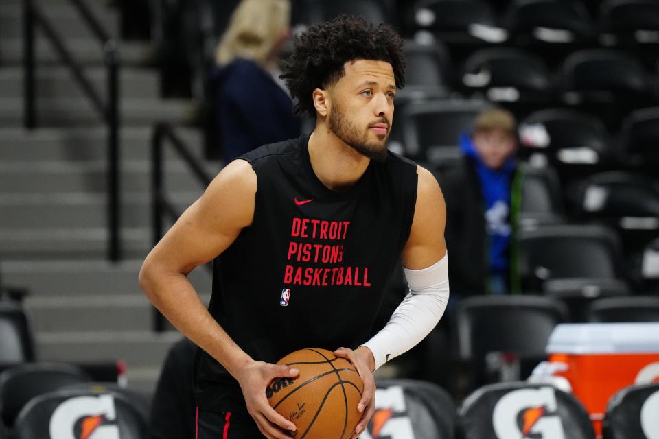 Detroit Pistons guard Cade Cunningham warms up before the game against the Denver Nuggets at Ball Arena, Jan. 7, 2024 in Denver.