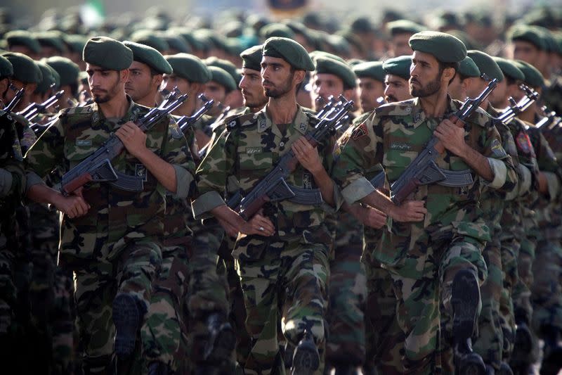 FILE PHOTO: Members of Iran's Revolutionary Guards march during a military parade to commemorate the 1980-88 Iran-Iraq war in Tehran